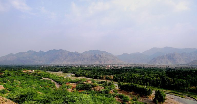 The Kohat valley with bare hills rising beyond the town
